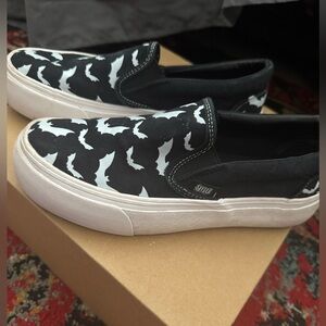 YRU Black and White slip-ons
